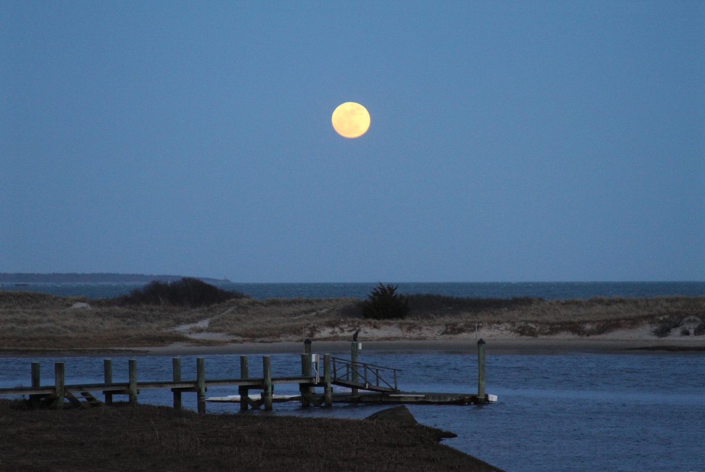 Full moon rising over Osterville and Hyannis waterfront